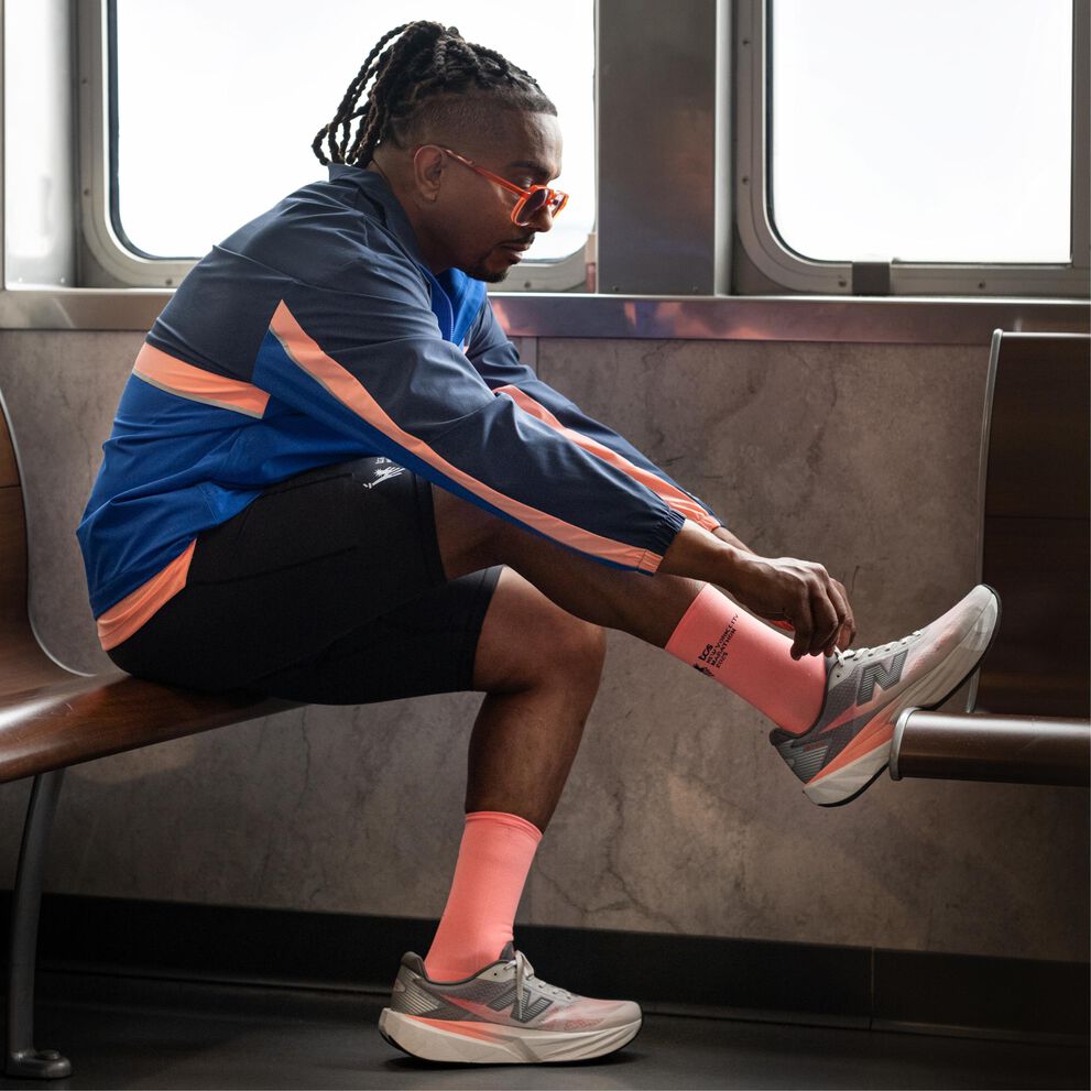  Knee down image of person wearing the FuelCell Rebel v5 with NYCM socks